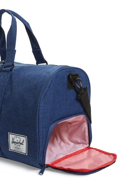 Shop Herschel Supply Co Novel Duffel Bag - Blue In Eclipse Crosshatch