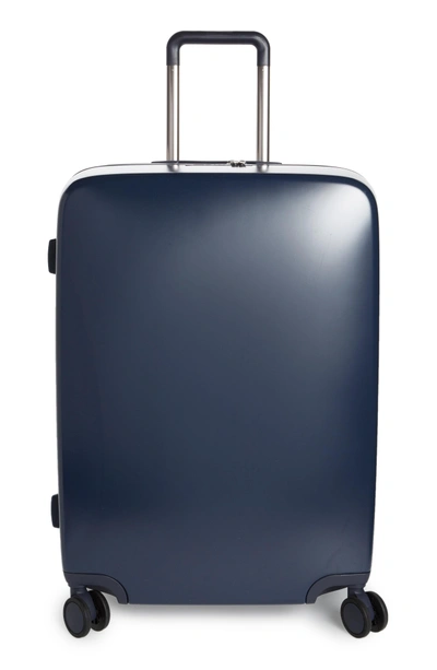 Shop Raden The A28 28-inch Charging Wheeled Suitcase - Blue In Navy Matte