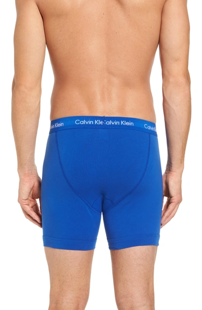Shop Calvin Klein 3-pack Boxer Briefs In Blue/ Muscari/ Deep Sunset