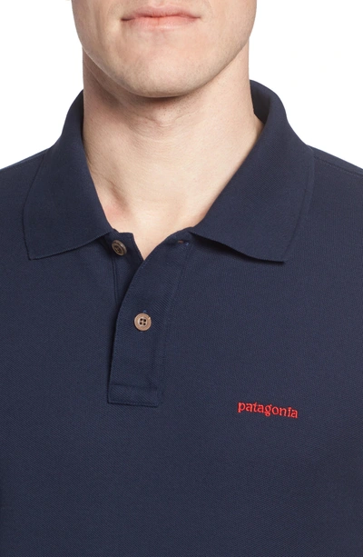Shop Patagonia Belwe Relaxed Fit Pique Polo In Navy Blue