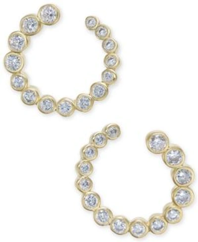 Shop Kate Spade New York Gold-tone Crystal Bypass Hoop Earrings In Clear Gold