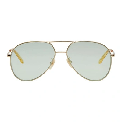 Shop Gucci Gold And Green Double Bridge Aviator Sunglasses In 8070 Gold