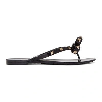 Shop Valentino Black  Garavani Rockstud Jelly Bow Sandals In 0no Black