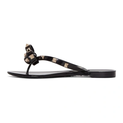 Shop Valentino Black  Garavani Rockstud Jelly Bow Sandals In 0no Black