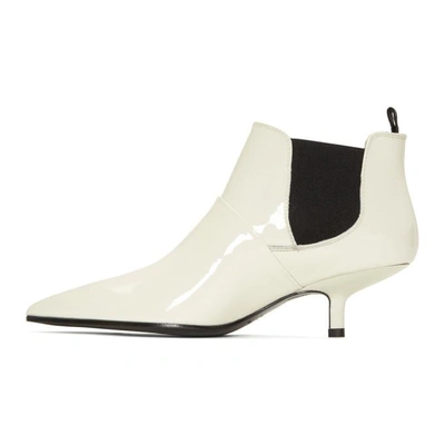 Shop Acne Studios Off-white Patent Kytti Boots In Off White