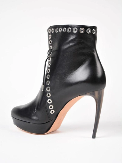 Shop Alexander Mcqueen Horn Heel Ankle Boots In Black