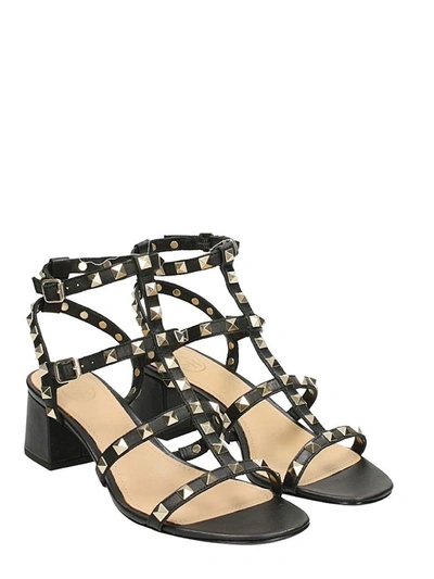 Shop Ash Rolling Studs Sandals In Black