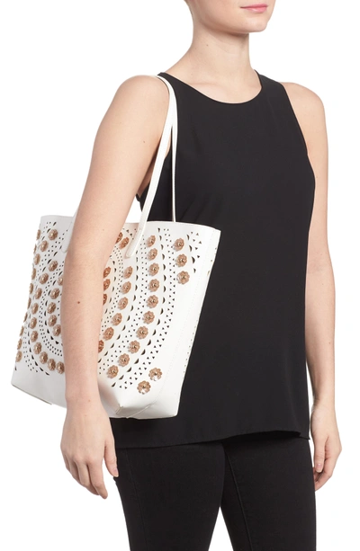 Shop Sondra Roberts Perforated Glitter Flower Faux Leather Tote - Beige In White