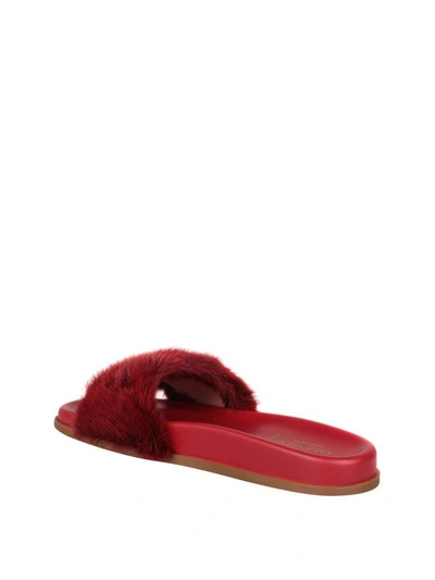 Shop Valentino Rockstud Mink Slides In Rosso