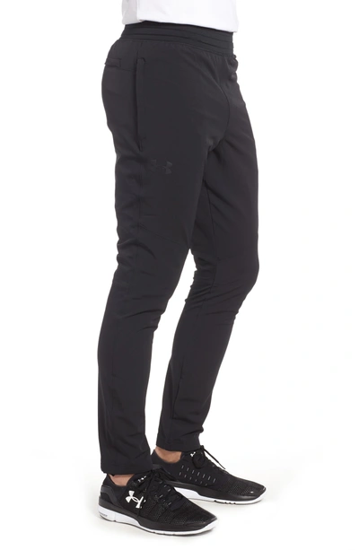 Shop Under Armour Tapered Slim Fit Woven Training Pants In Black