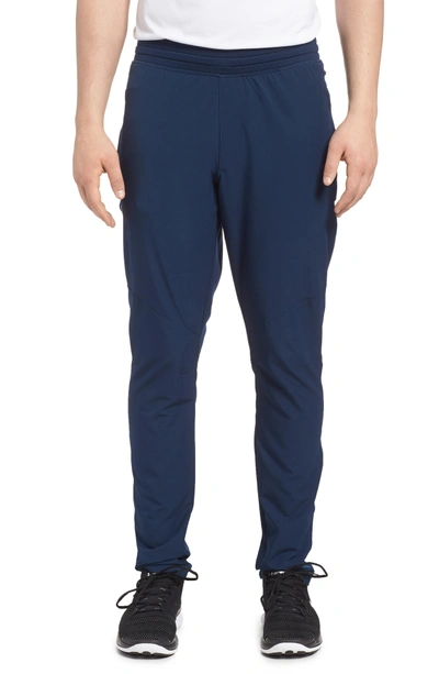 Shop Under Armour Fitted Woven Training Pants In Academy/ Black