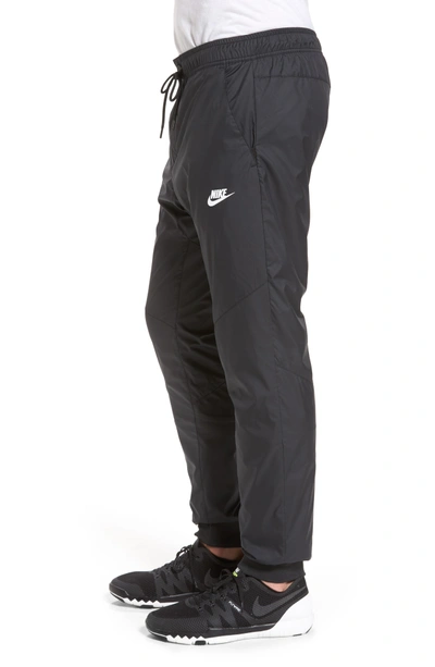Nike Men's Sportswear Windrunner Jogger Pants, Black | ModeSens