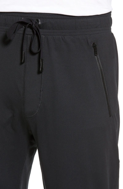 Shop Alo Yoga Renew Relaxed Slim Fit Lounge Pants In Black