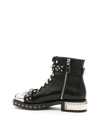 Shop Alexander Mcqueen Studded Leather Booties In Black (black)