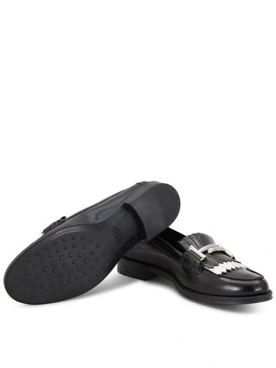 Shop Tod's Double T Fringed Leather Loafers In Black