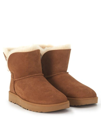 Ugg Classic Cuff Mini Ankle Boots In Leather Suede In Marrone | ModeSens