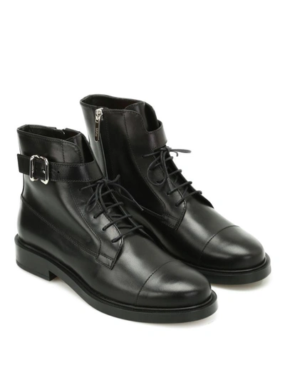 Shop Tod's Boots In Leather In Black