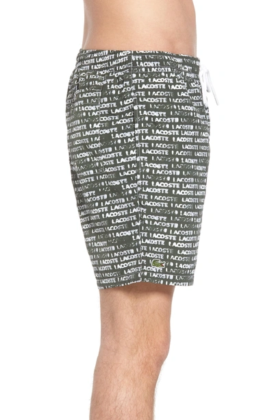 Shop Lacoste Flowing Print Swim Trunks In Green/ White