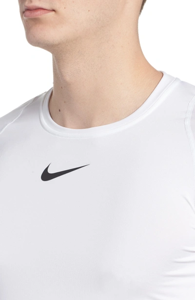 Shop Nike Pro Fitted T-shirt In White/ Black