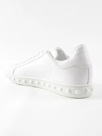 Shop Moncler Studded Sole Sneakers In White