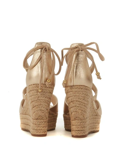 Shop Ugg Model Reagan Golden Leather Wedge Sandal In Oro