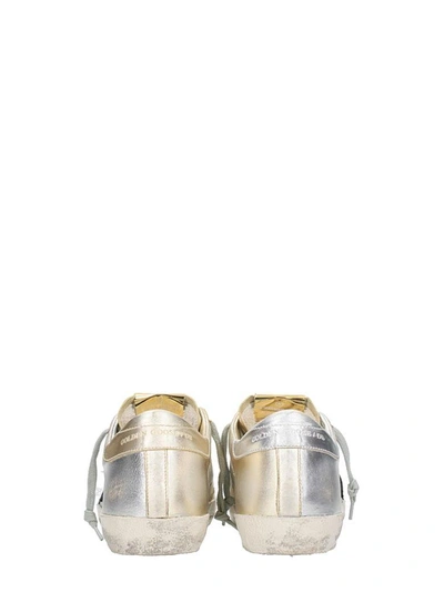 Shop Golden Goose Superstar Silver Gold Sneakers