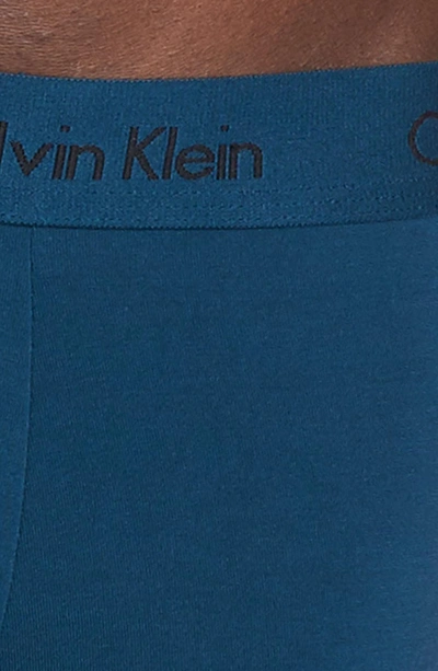 Shop Calvin Klein U5554 Micromodal Trunks In Sb6 Stream