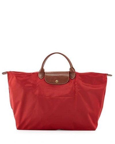 Shop Longchamp Le Pliage Large Travel Bag In Red