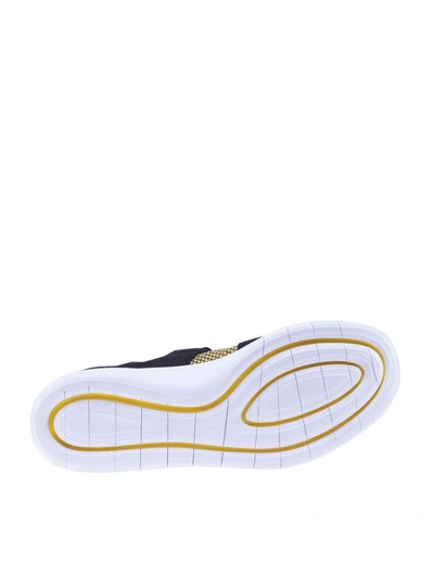 Shop Nike Tm Sock Racer Ultra Flyknit In Blackyellow