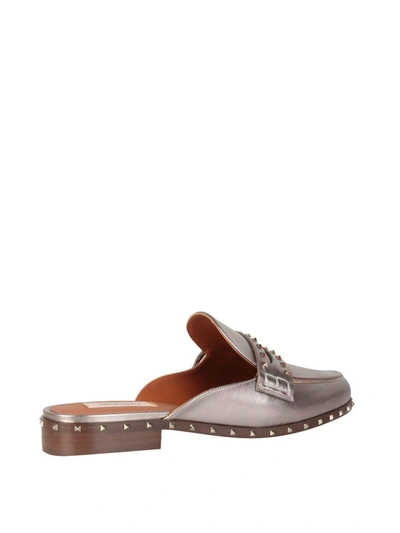 Shop Valentino Laminated Rockstud Loafers In Oro