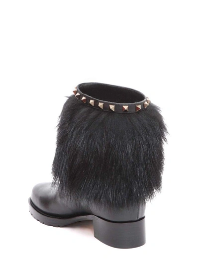 Shop Valentino Rockstud Winter Boots In Nero