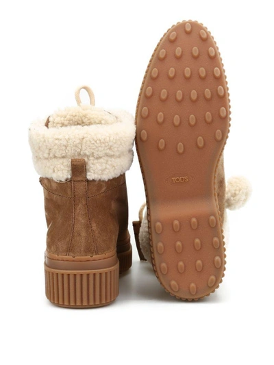 Shop Tod's Boots In Beige