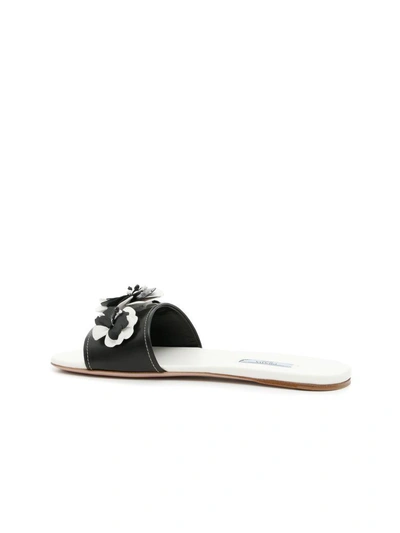 Shop Prada Leather Flower Slides In Nero+bianconero