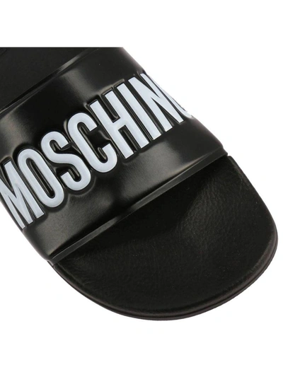 Shop Moschino Sandals  Slides Low Sandal In Pvc And Wide-grained Rubber With Contrasting Logo In Black