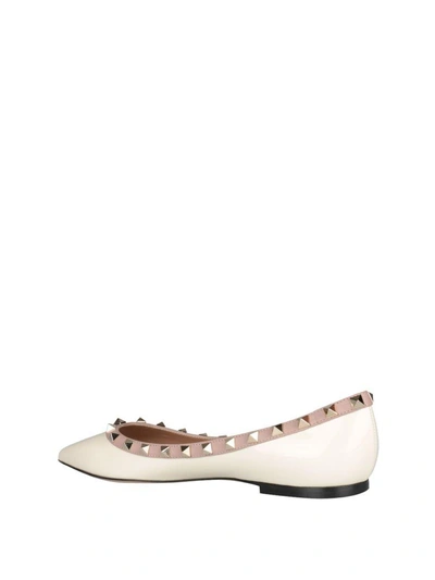 Shop Valentino Rockstud Patent Leather Flats In Bianco