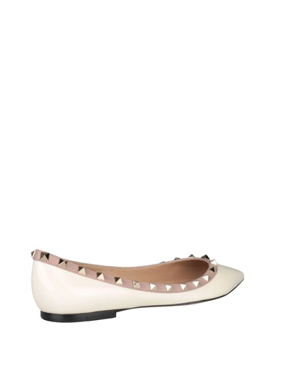 Shop Valentino Rockstud Patent Leather Flats In Bianco