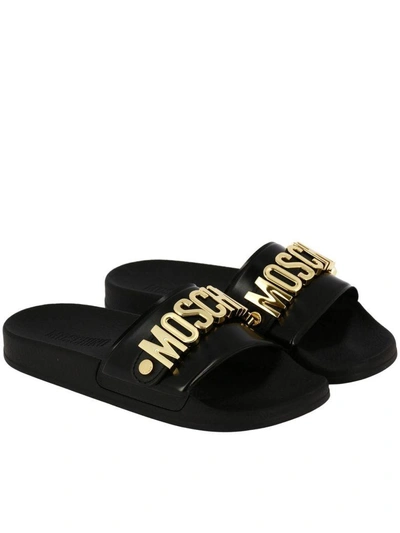 Shop Moschino Flat Sandals  Slides Low Sandal In Pvc And Wide-grained Rubber With Contrasting Logo In Meta In Black