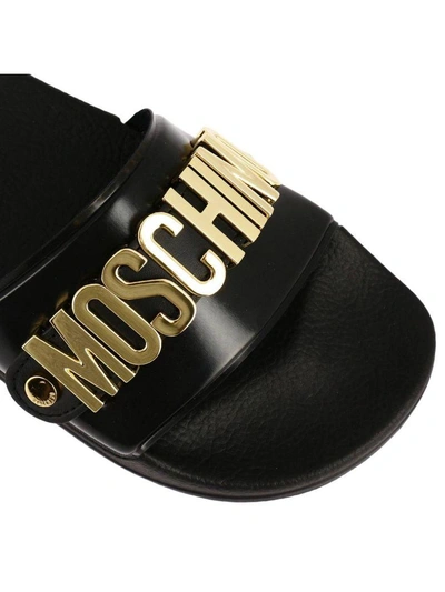 Shop Moschino Flat Sandals  Slides Low Sandal In Pvc And Wide-grained Rubber With Contrasting Logo In Meta In Black