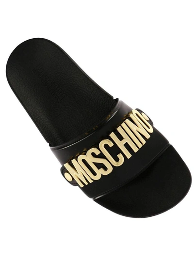 Shop Moschino Flat Sandals  Slides Low Sandal In Pvc And Wide-grained Rubber With Contrasting Logo In Meta In Black