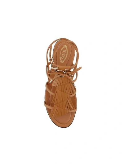 Shop Tod's Fringed Sandals In Leather