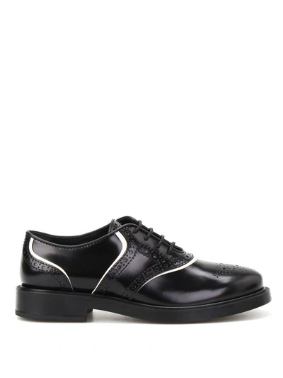 Shop Tod's Laced Shoes In Black+yogurt