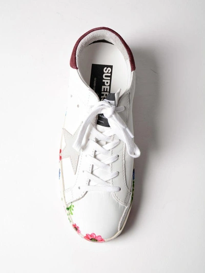Shop Golden Goose Baux Hand Painted Sole Sneakers In White