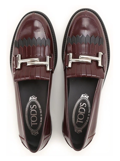 Shop Tod's Double T Fringed Leather Loafers In Must+black