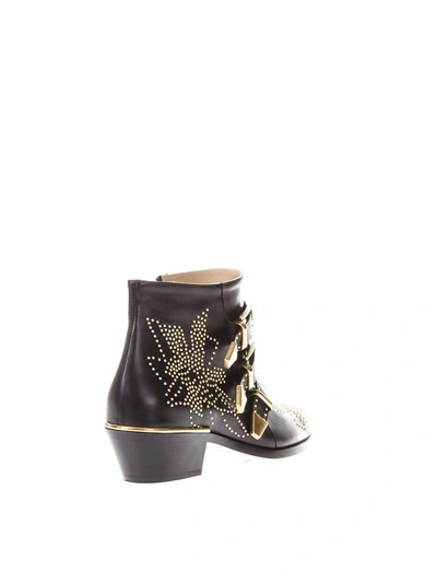 Shop Chloé Susanna Black Sheepskin Ankle Boots In Black-gold