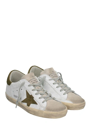 Shop Golden Goose Superstar White Sneakers