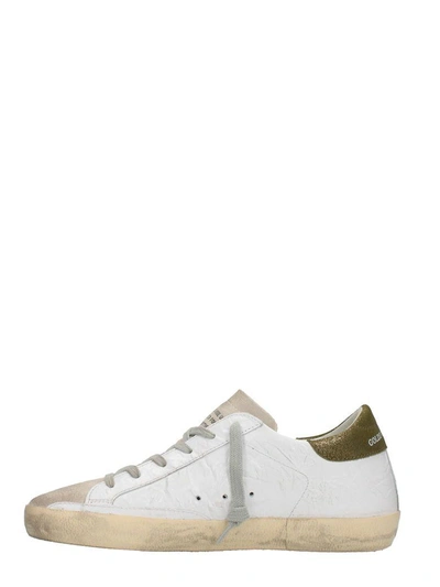 Shop Golden Goose Superstar White Sneakers