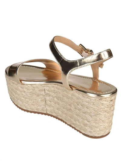 Shop Michael Michael Kors Nantucket Wedge Sandals In Pale Gold