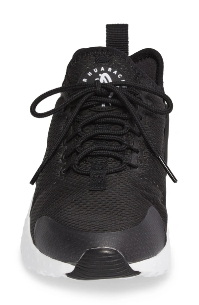 Shop Nike Air Huarache Sneaker In Black/ Black/ Black/ White