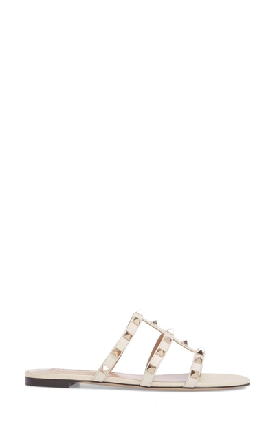 Shop Valentino Rockstud Slide Sandal In Light Ivory