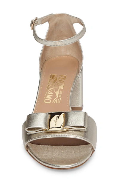 Shop Ferragamo Gavina Block Heel Bow Sandal In Metallic Silver